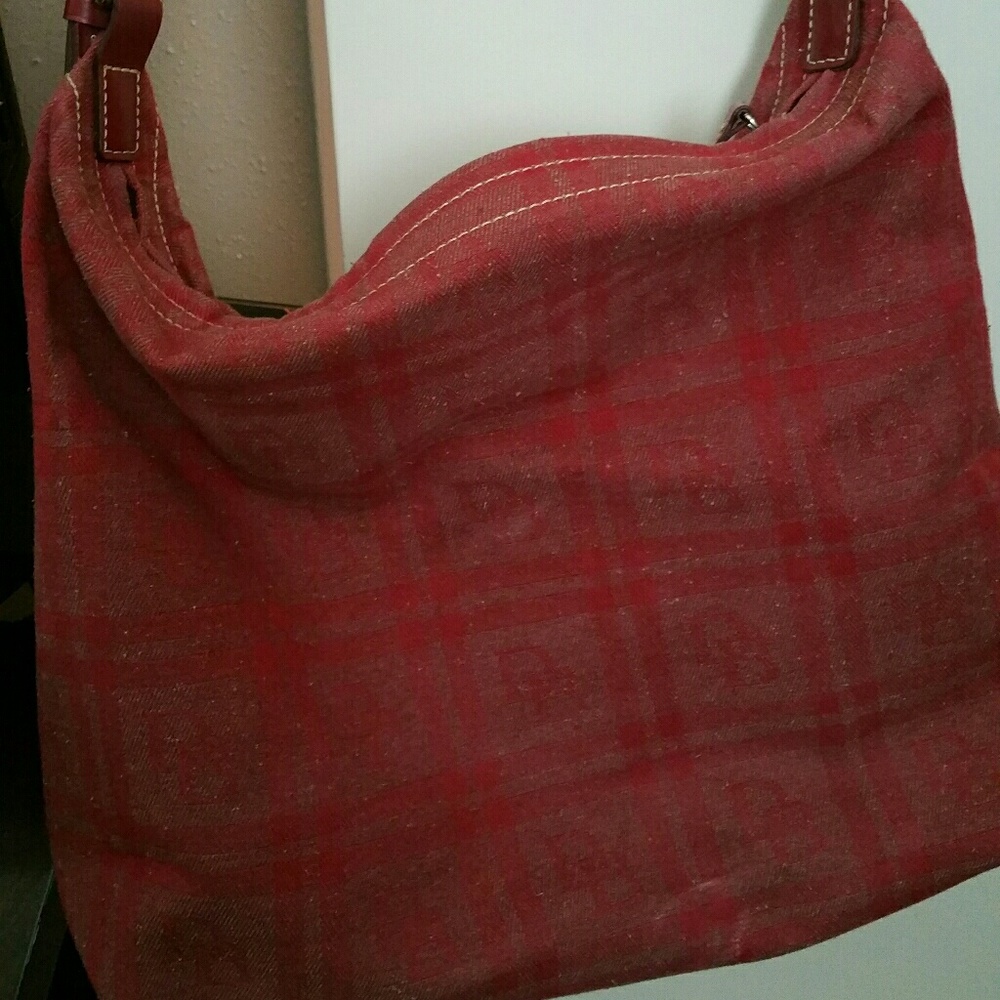 A beautiful red Dooney & Bourke woman's purse