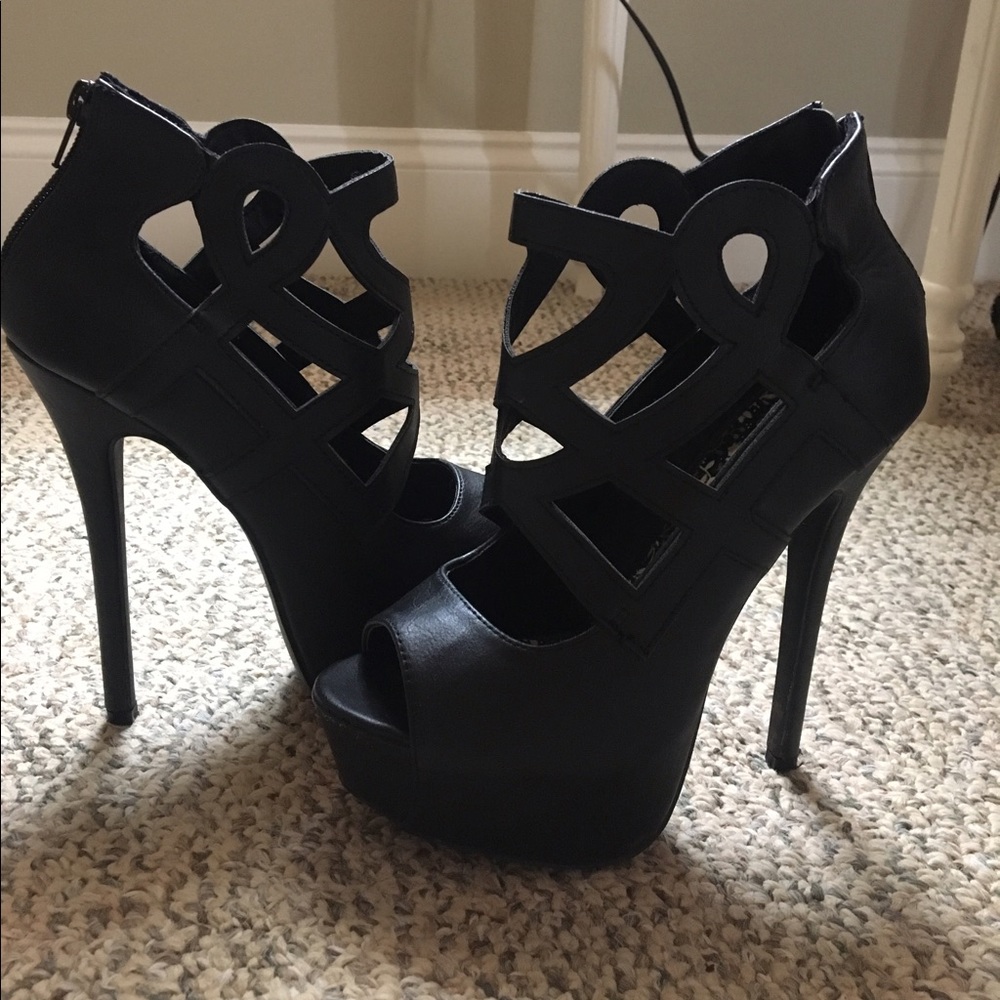 Size 6, worn once, black high heels