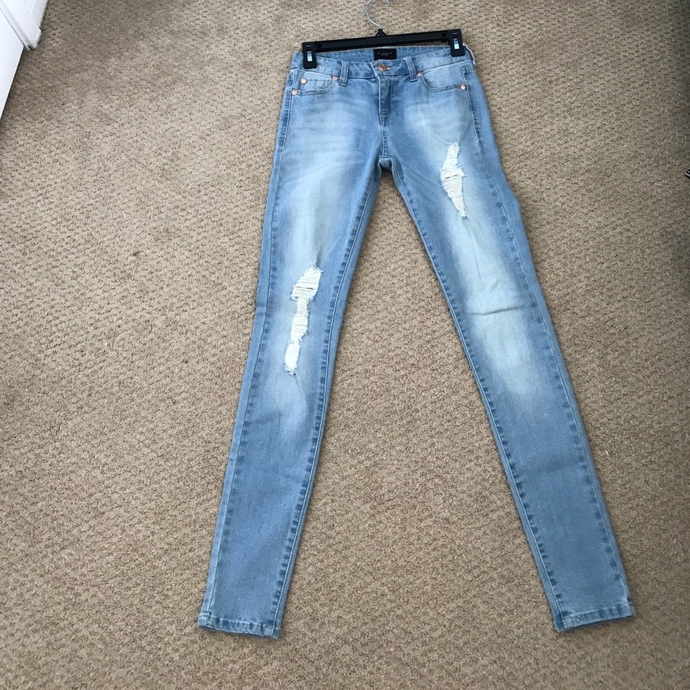 Celebrity pink blue distressed denim jeans