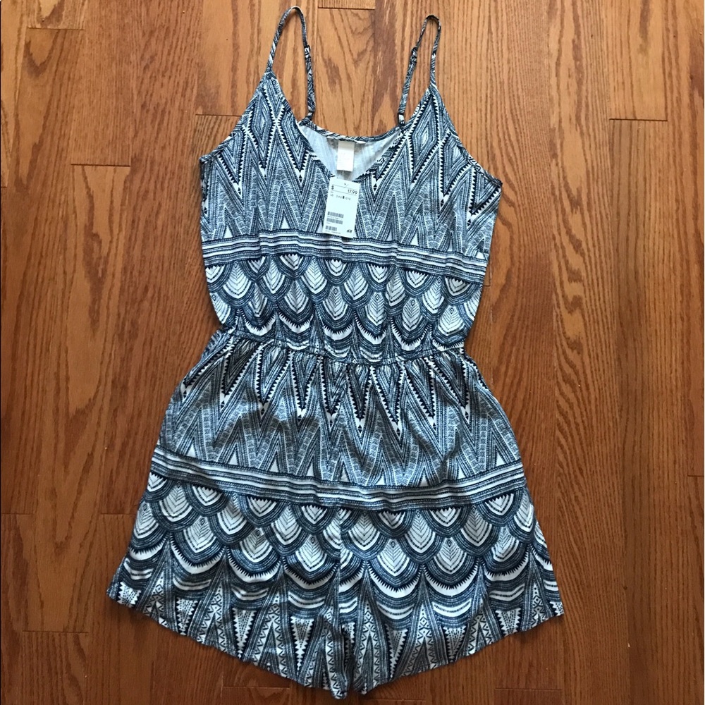 H&M navy blue romper. Never worn, tag attached