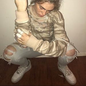 Custom distressed sweater