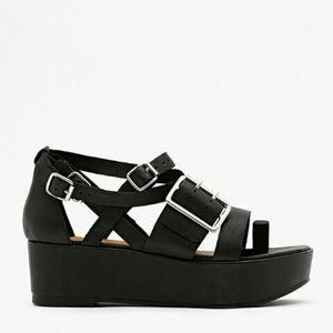 Jeffrey Campbell flatform sandal.