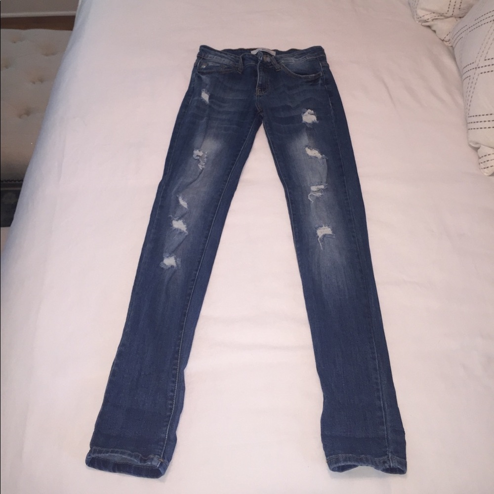 Distressed skinny jeans