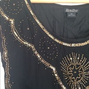 Lucky black dress with beautiful gold beading