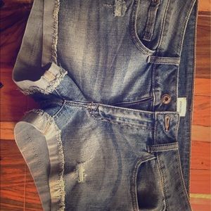 Sneak Peek Low Rise Distressed Denim Shorts