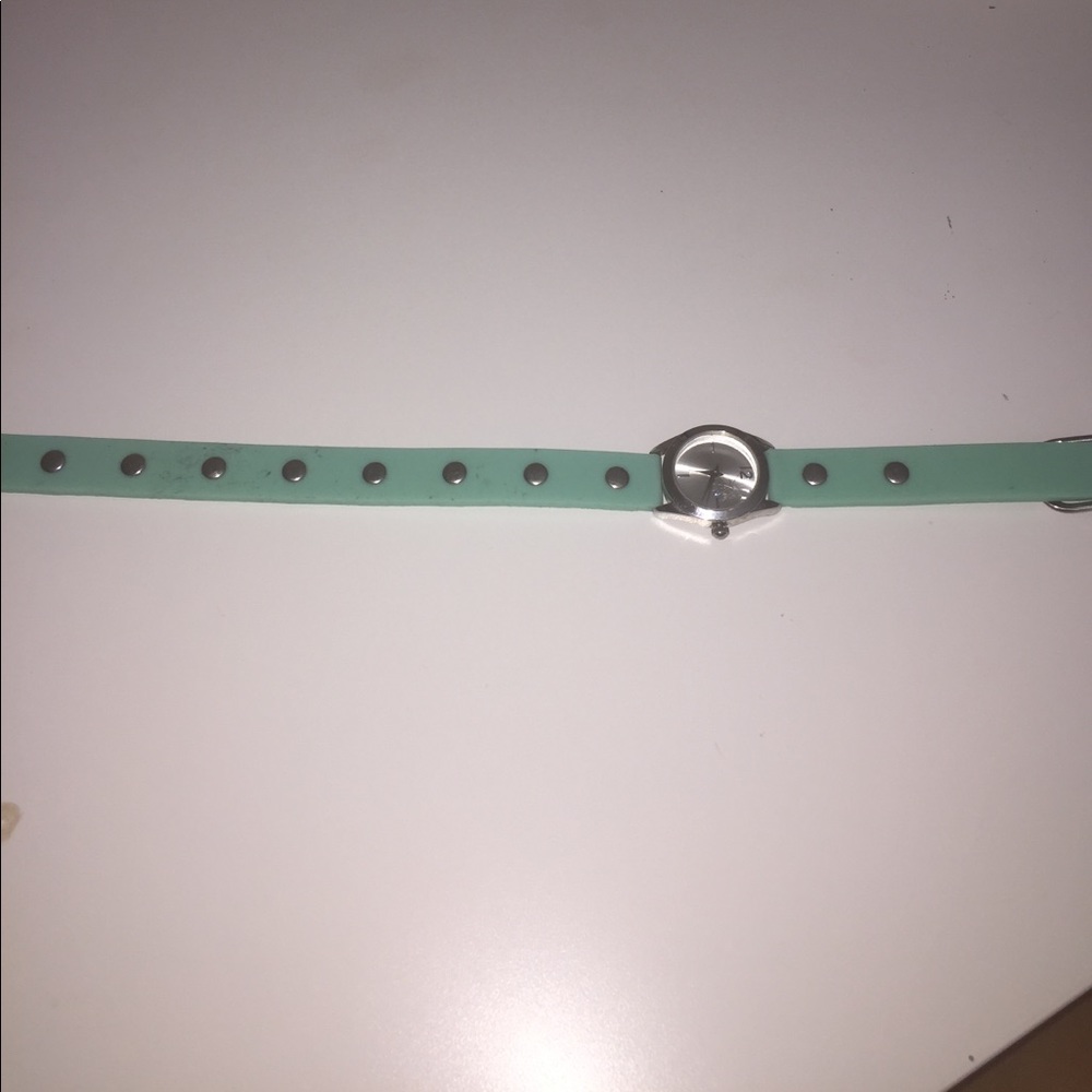 A long turquoise watch