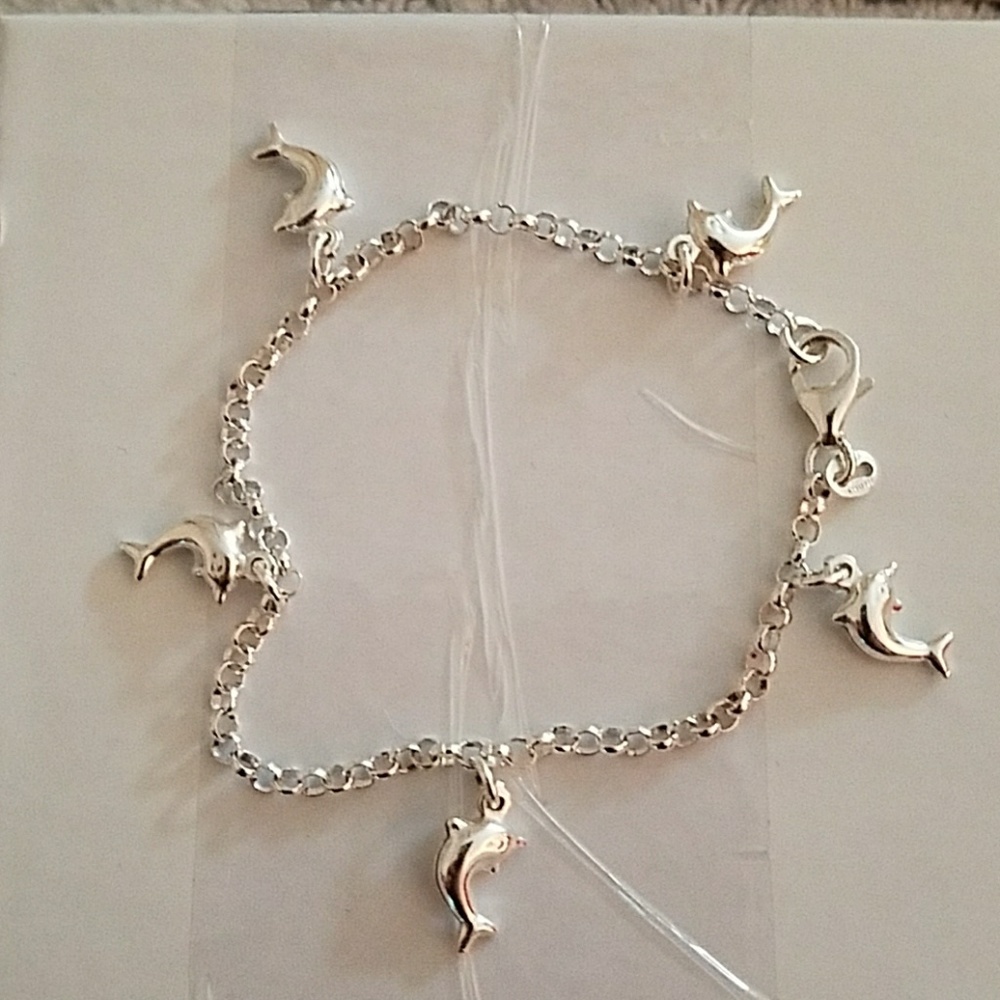 Anklet with dangling dolphins
