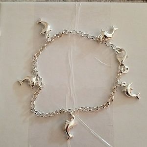 Anklet with dangling dolphins