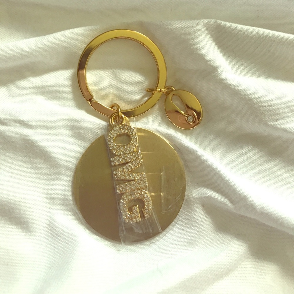 NWOT OMG gold keychain