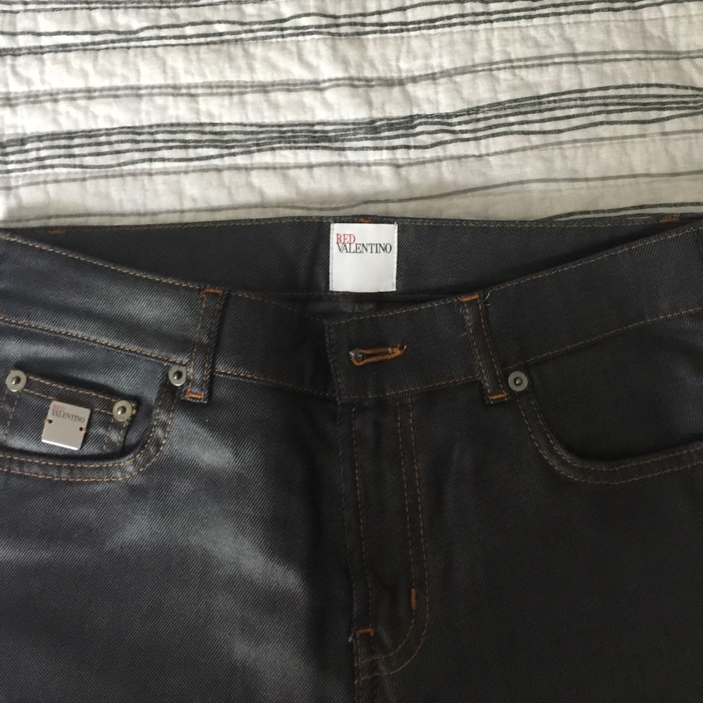 Valentino coated denim pants
