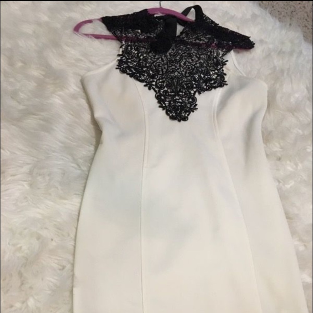 White and black sleeveless cocktail dress