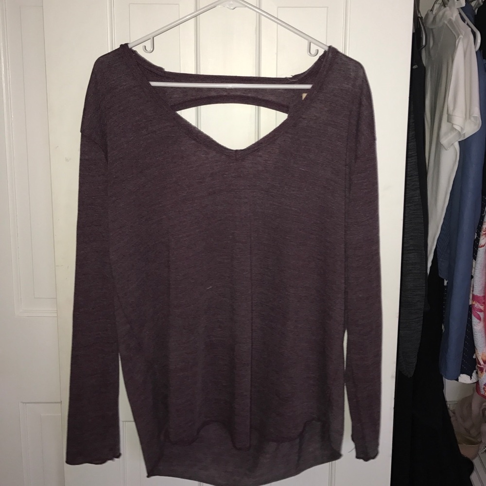 Purple top size large. Fits S/M