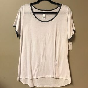 Small white LuLaRoe Classic Tee