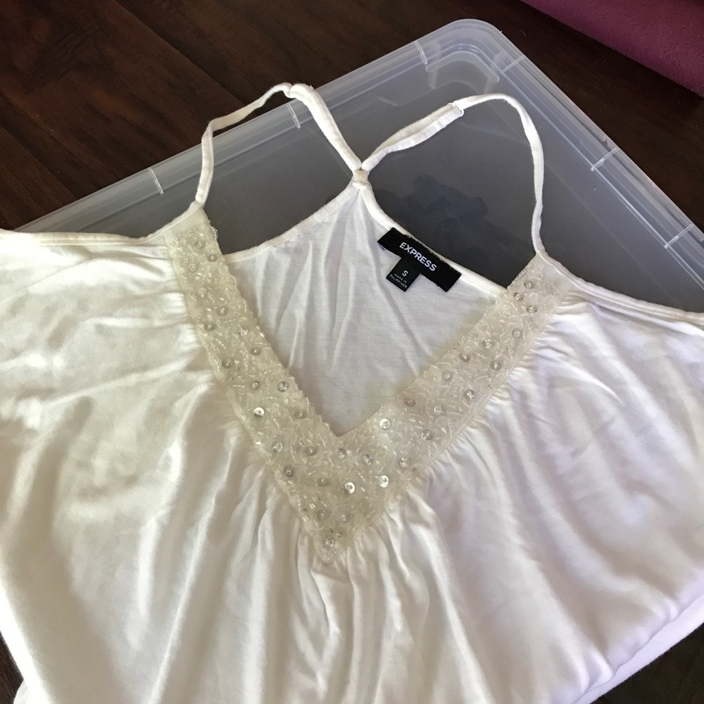 Cute white top with sequin details