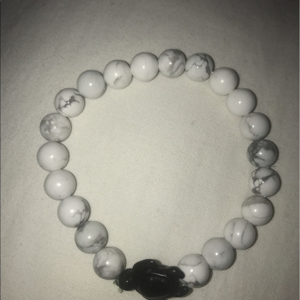 white marble bracelet with a black turtle