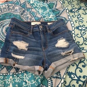 medium wash ripped denim shorts