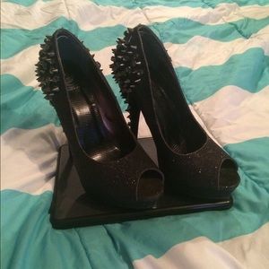 Black stud and jeweled high heels