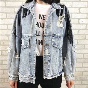 Oversized distressed fringed denim jacket