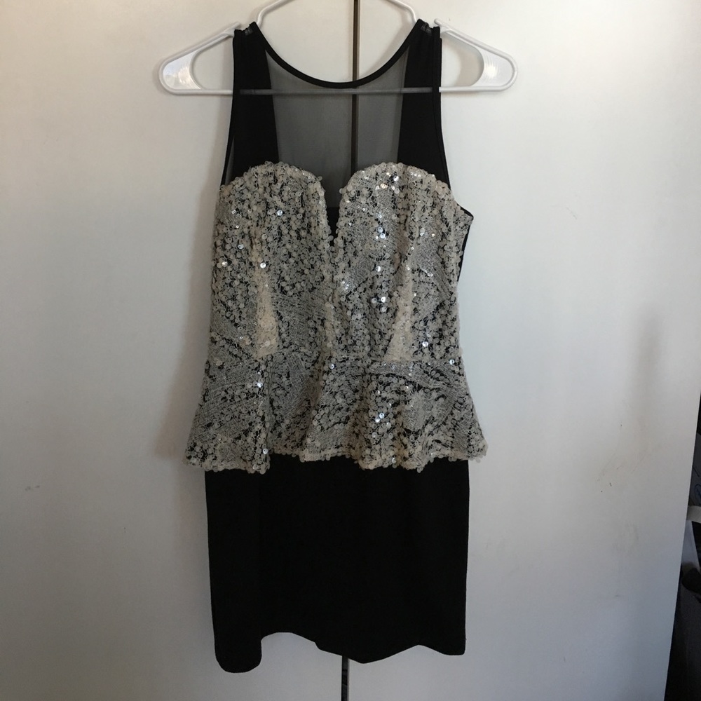 FOREIGN EXCHANGE sequin peplum top dress