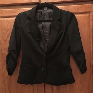 Black blazer jacket.