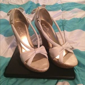 White strappy wedges