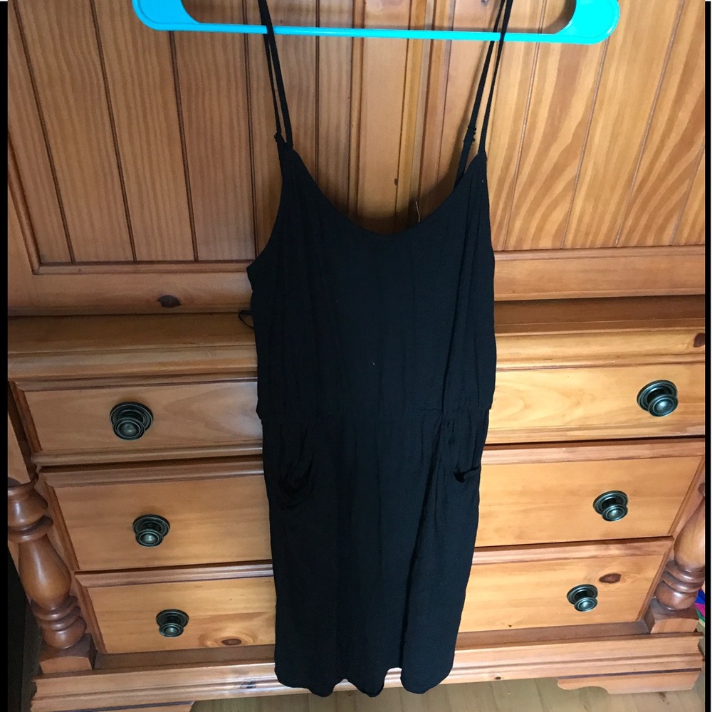 Forever 21 black strap dress with pockets. Size M.