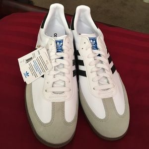 Never worn. White and black sambas. Size 12 US