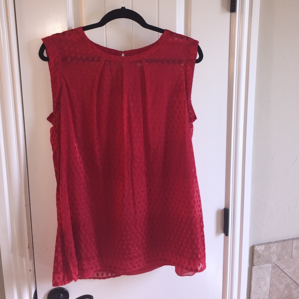Red sleeveless top