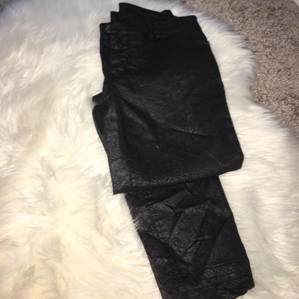 Leather pants with flower print