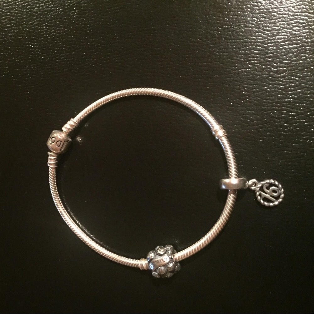AUTHENTIC Pandora bracelet INCLUDES TWO CHARMS