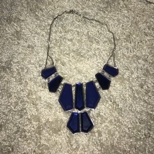 Navy blue necklace.