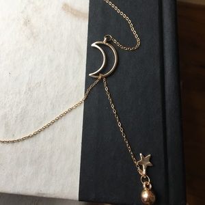 Adjustable high low gold moon and star necklace