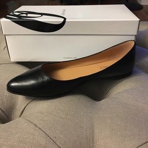 Black leather flats