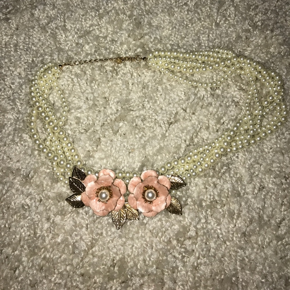 Pearl , rose and gold necklace.