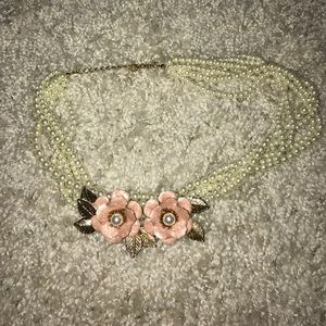 Pearl , rose and gold necklace.