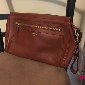 Coach clutch/wristlets in brown leather