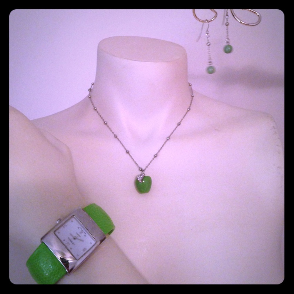 Vibrant lime green watch, earrings, and necklace.