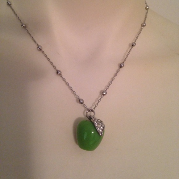 Vibrant lime green watch, earrings, and necklace. - Picture 3 of 5