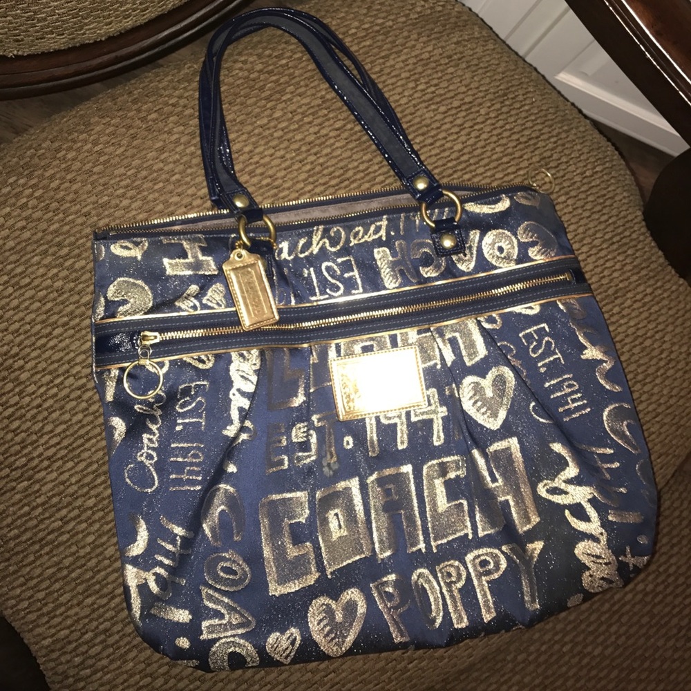 Navy and gold Coach Poppy purse
