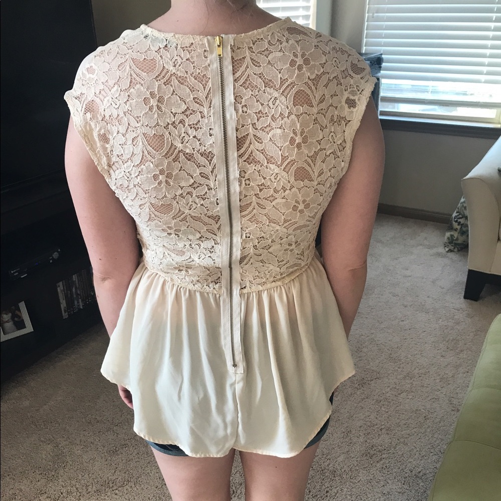 Peplum top with lace zipper back