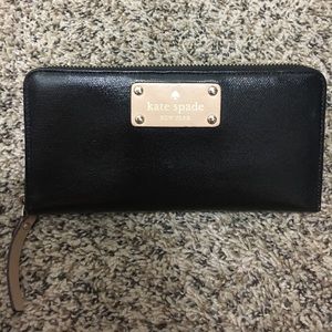 Black patent leather Kate Spade zip around wallet