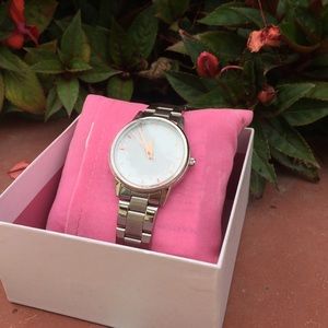 Rose gold and silver watch by icing