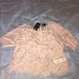Pastel pink see-through lace blouse
