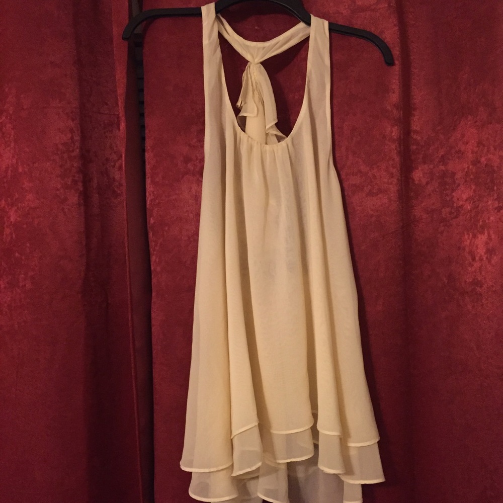 Cream colored sheer shirt