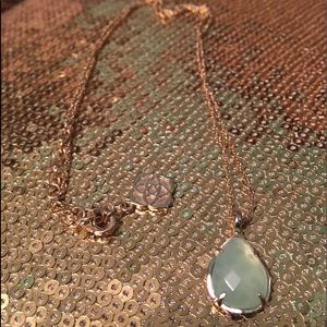 Kendra Scott necklace.