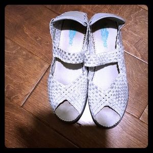 Silver open toed shoes