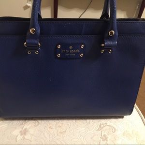 Blue Kate Spade bag.