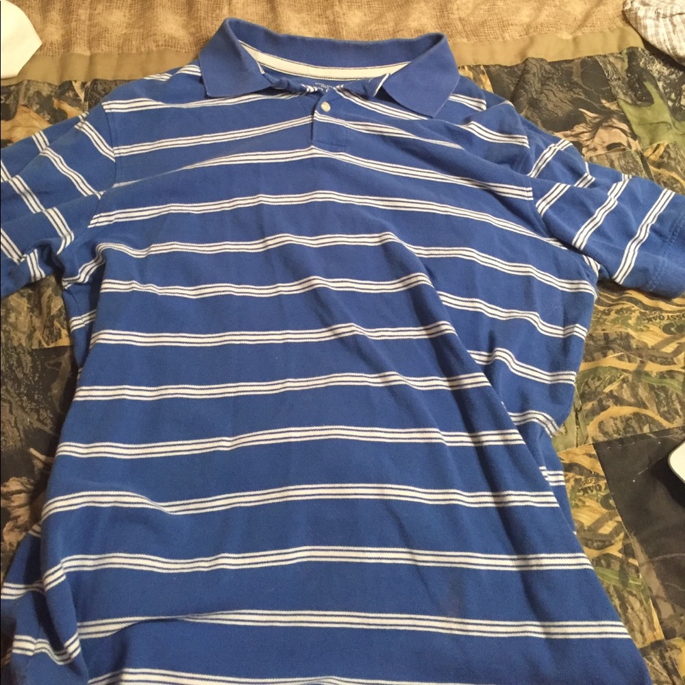 Blue polo with white stripes