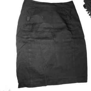 H & M BLACK SKIRT  with bows on side. Size 2