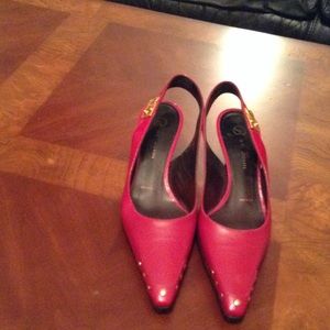 Red pair of ST. John Shoes